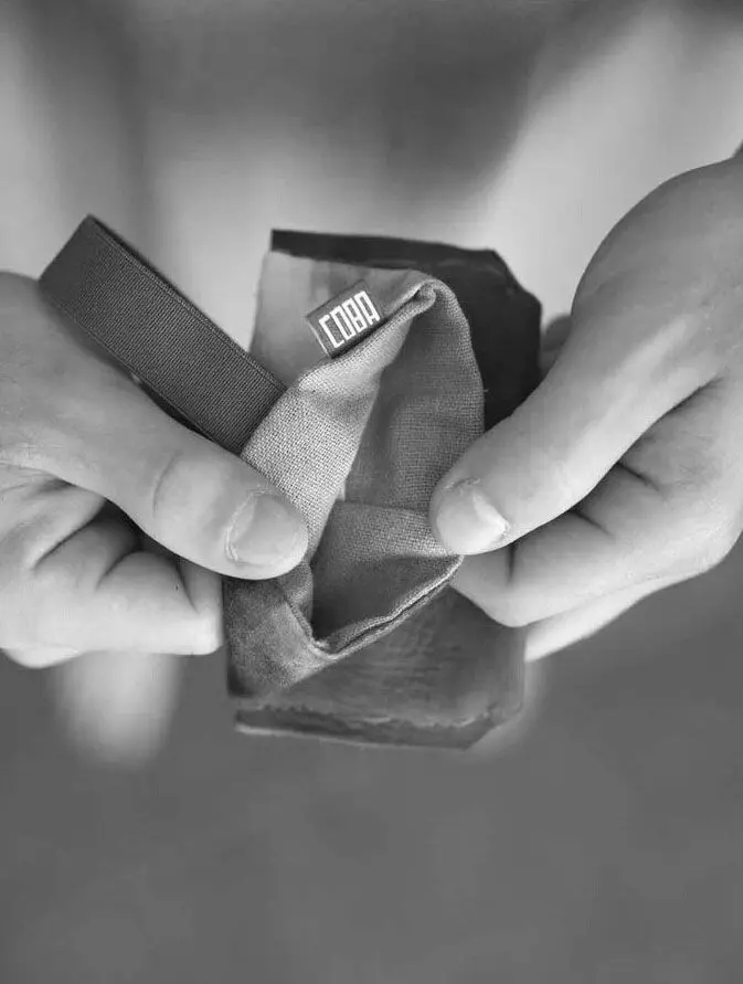 Cartera de tela recuperada a rayas
