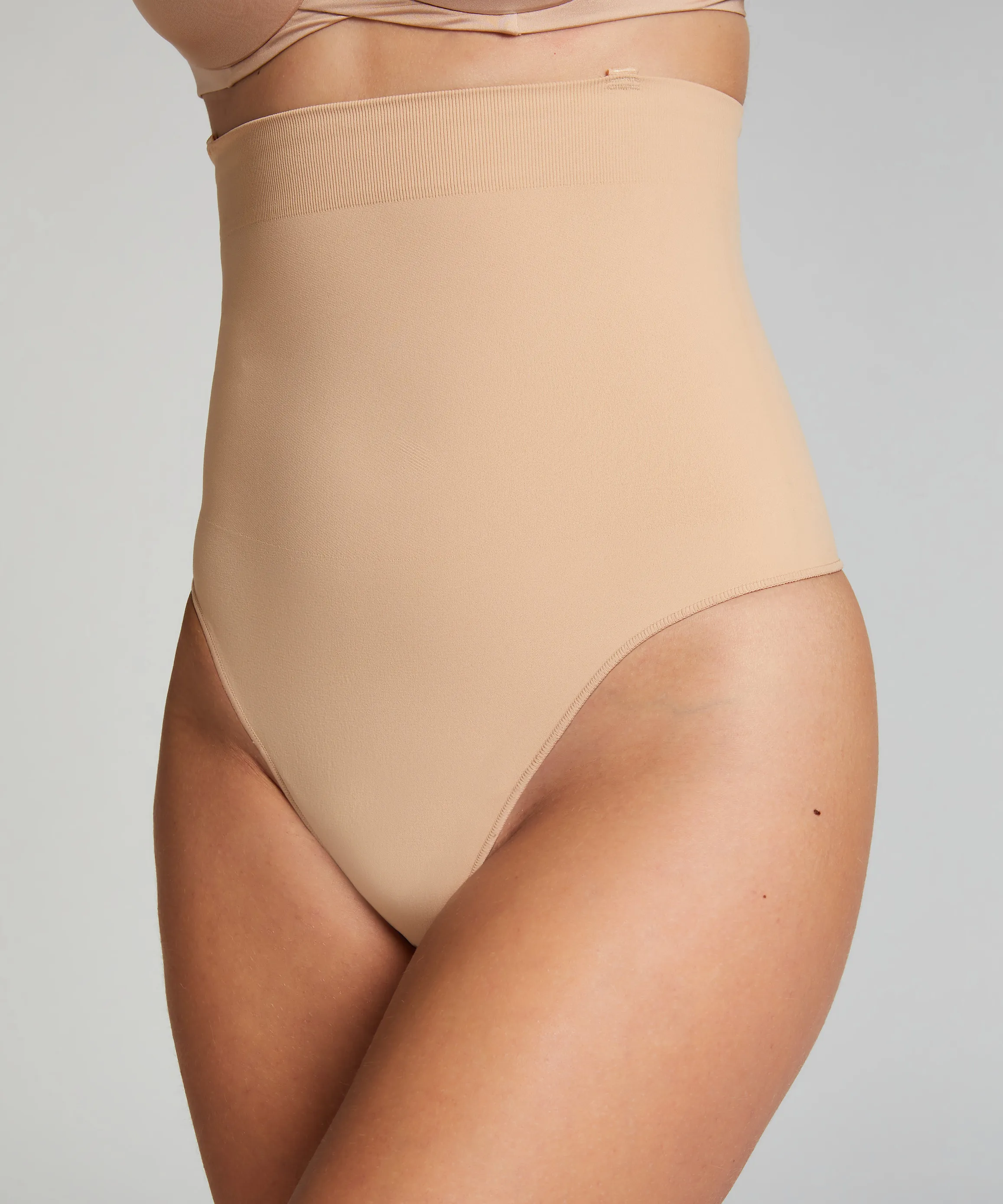 INVISIBLE TANGA  BEIGE