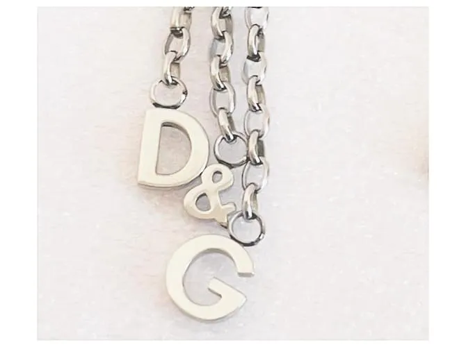 Pendientes Dolce & Gabbana modelo DJ0150 tres hilos con logo de acero Plata 