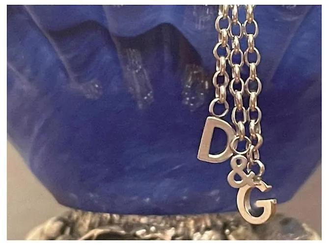 Pendientes Dolce & Gabbana modelo DJ0150 tres hilos con logo de acero Plata 