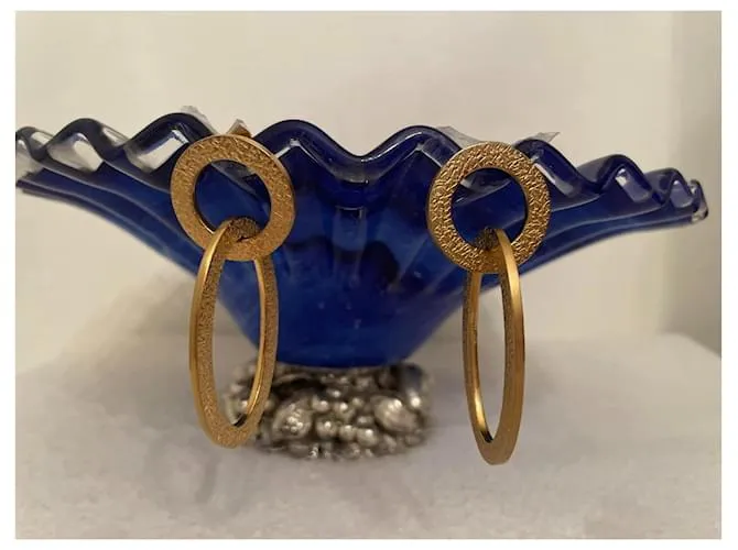 Pendientes dorados DOLCE & GABBANA con círculo alargado y logo 