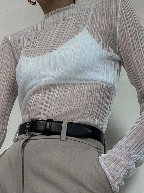 Top de punto semitransparente de cuello alto