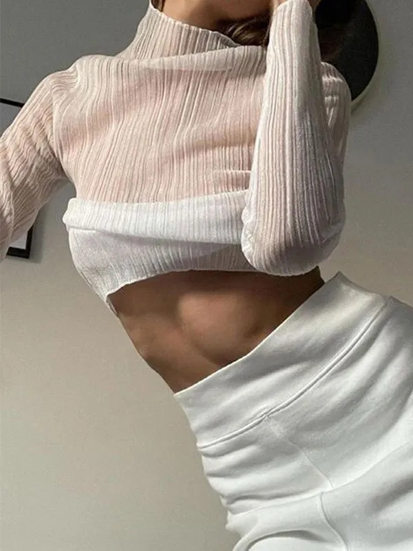 Top de punto semitransparente de cuello alto