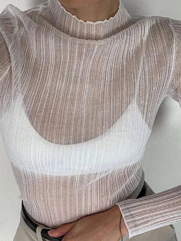 Top de punto semitransparente de cuello alto