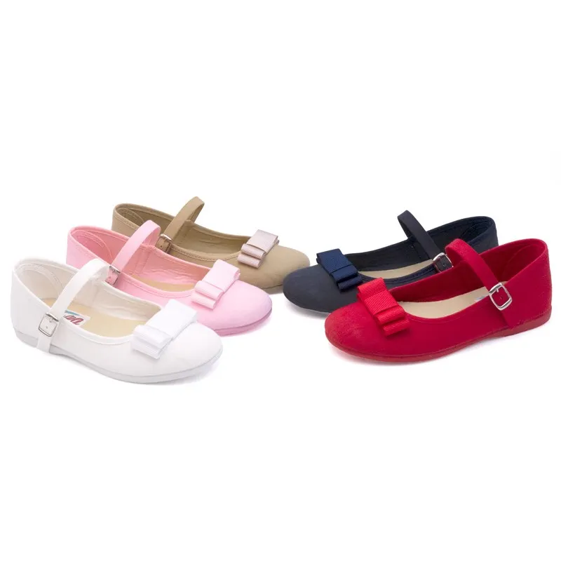 Zapatos de niña en lona con lazo
